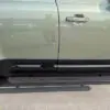 Estribo lateral desplegable Land Rover Defender